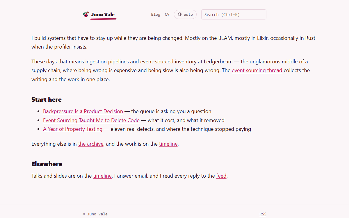 The cherrybomb theme home page: hot pink accents on a poster-paper ground