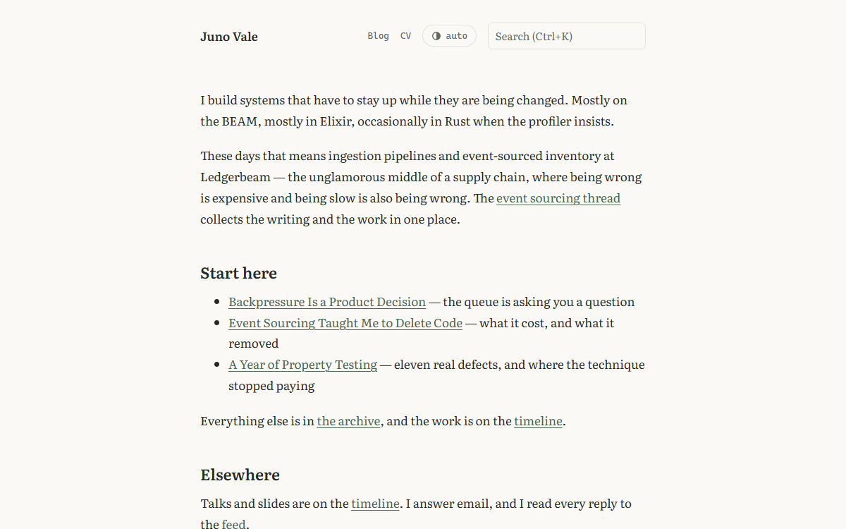 The porcelain theme home page: warm ceramic white with sage green links