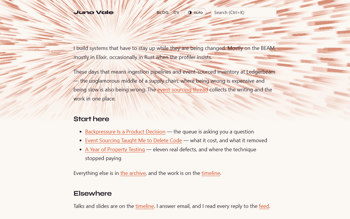 The warp theme post page: orange light streaks behind a large Syne title